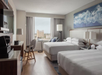 Queen room, 2 queen beds, work desk, flat-screen TV at Tampa Marriott Water Street, FL.
