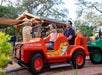 A father with his daughter are all smiles as they went on a chill yet fun ride  available in the Zoo.