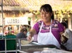 Woman cooking tacos