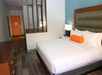 One king bed inside a guest room.
