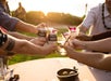Toasting the evening at The Feast of Mokapu Luau, on the manicured grassy lawn of the Andaz Maui at Wailea Resort in Wailea, Hawaii, USA.