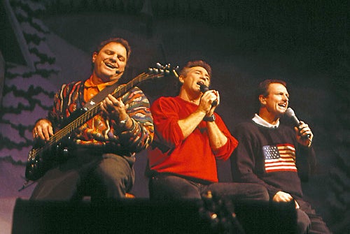 Singing and playing guitar, the Gatlin Brothers come together at The Mansion Theatre