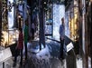 People walking through a snowy display at the National WWII Museum.