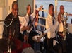 A group of musicians playing and having a good time on the Paddlewheeler Creole Queen Jazz Cruise.