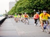 Guests biking along the Hudson River on The New York City Highlights Bike Tour in New York, NY