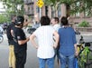 A Guide pointing out a local spot on The New York City Highlights Bike Tour in New York, NY
