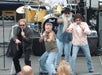 The Oak Ridge boys sing with drums in the background