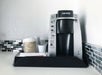 Coffee maker with free coffee inside a guest room.