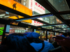 Guests are enjoying an uninterrupted view of the New York streets through the transparent ceiling of the bus.