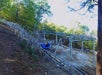 Runaway Mountain Coasters with riders up and down the hill