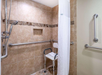 Easy access and comfort with a roll-in shower.