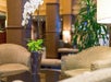Lobby with seating area and table.