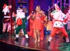 The cast in Christmas costume dancing at The South's Grandest Christmas Show - Alabama Theatre - Myrtle Beach, SC