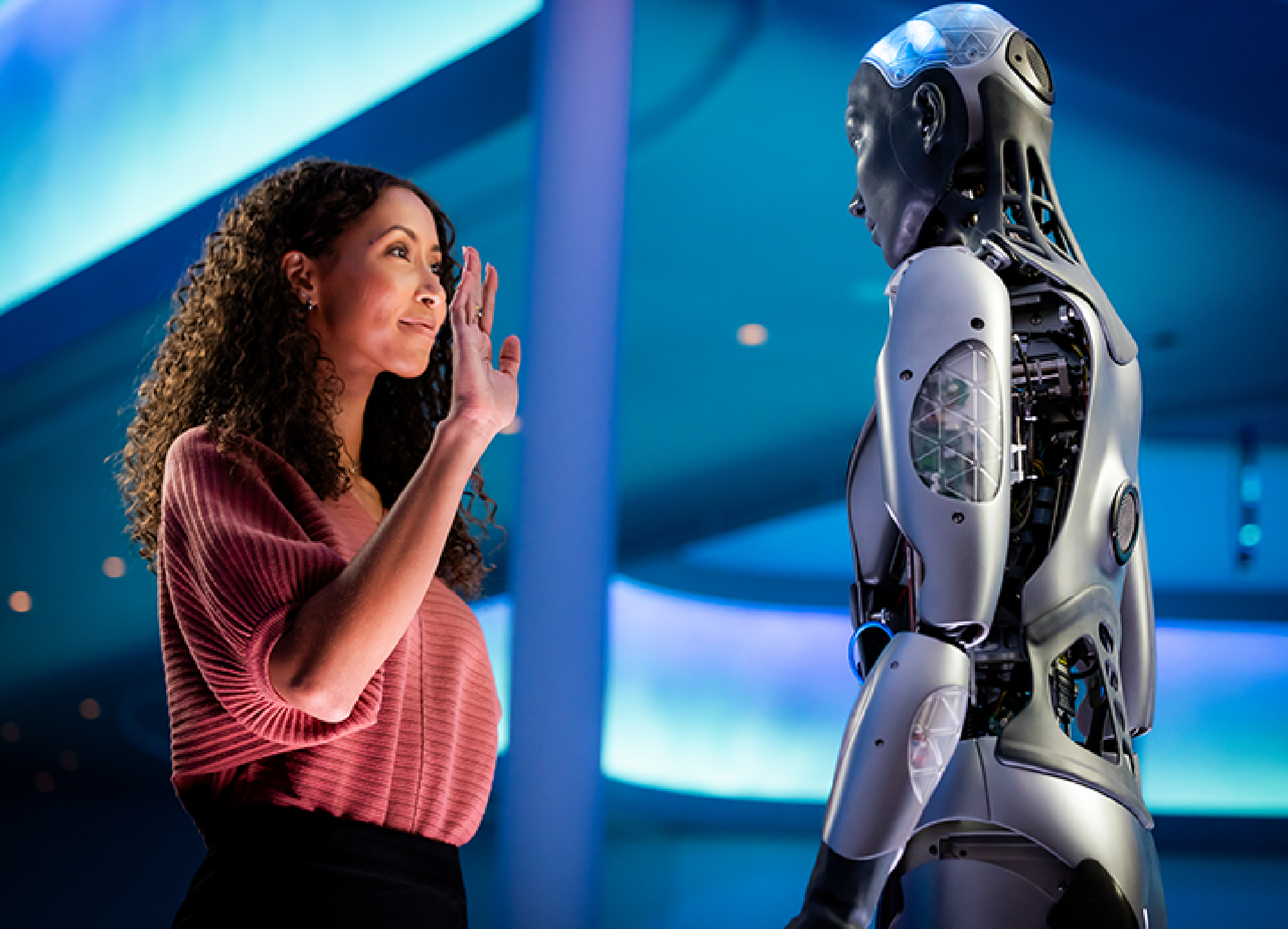 A woman is chatting with the interactive robots at The Sphere, Las Vegas, Nevada.
