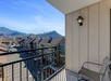 A private balcony with scenic mountain views.