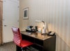 In-room work desk with chair.