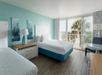Two double beds and a private Juliette balcony