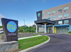 Hotel signage and exterior view.