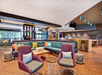 Hotel lobby with ample seating.