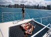 Basking in the sun in a catamaran yacht at Turtle Canyon reef