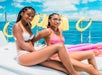 Two girls relaxing on the catamaran in Waikiki, Hawaii.