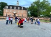 People hold up their hands during a Pirate decree