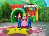 An animated entrance to Super Nintendo World with iconic characters extending a warm welcome.