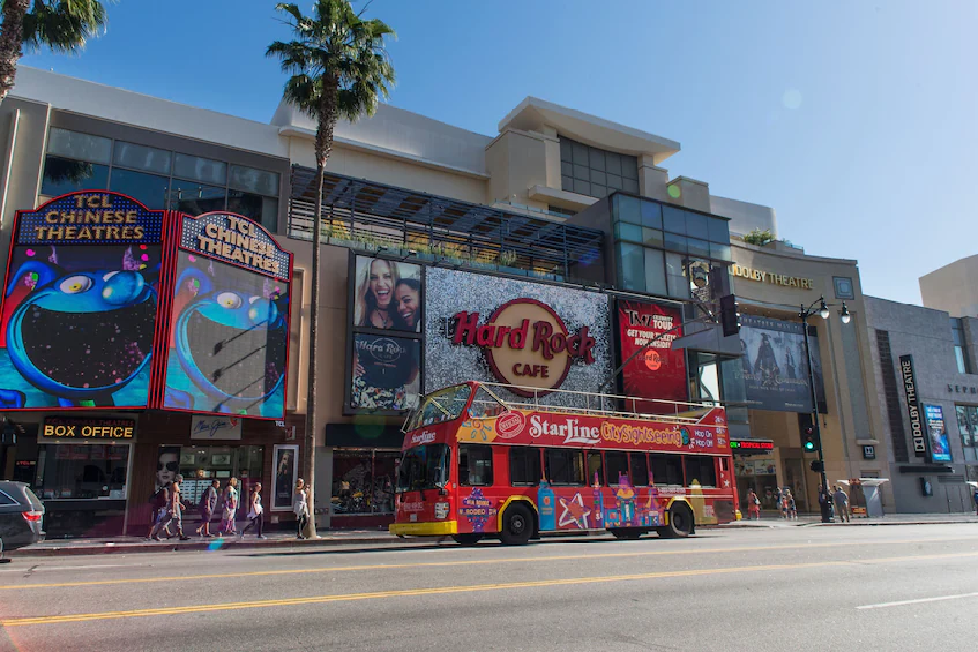 A red double-decker bus in front of the Hard Rock Cafe in Los Angeles, California.