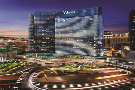 Modern hotel exterior at night.
