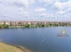 Aerial view of the condos and the lake.