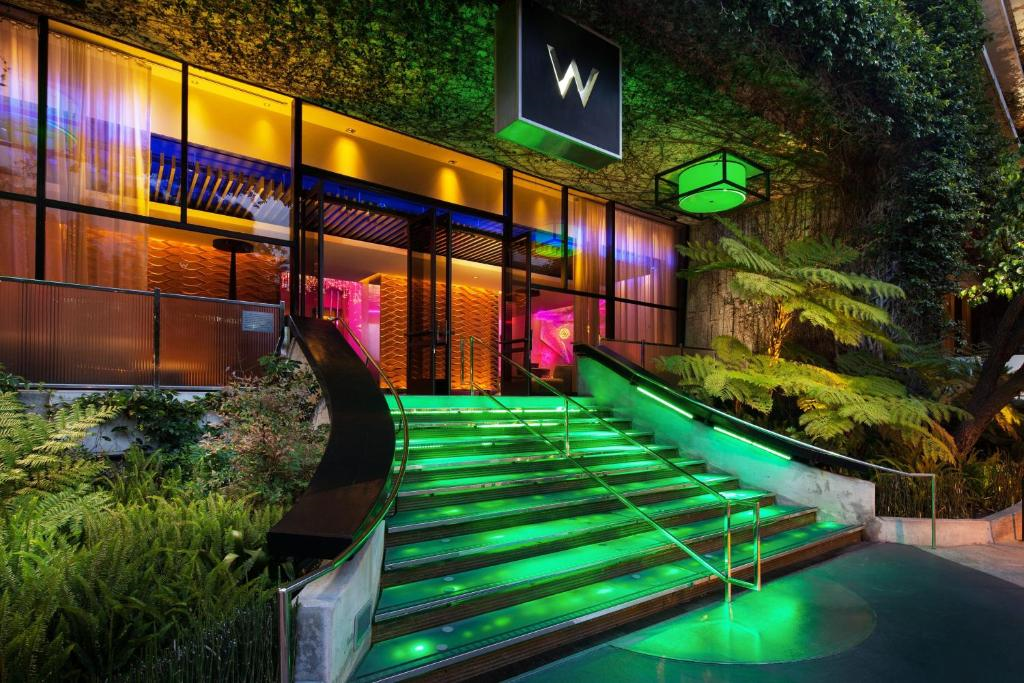 Exterior of the hotel at night.