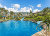 Picturesque outdoor pool with slides.