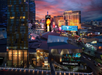 Aerial view of Las Vegas Strip at sunset, featuring illuminated hotels, casinos, and retail signs like Gucci and Dolce & Gabbana, against a vibrant evening sky.