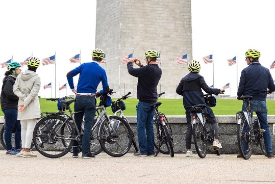 Unlimited Biking renters taking photos at the Monuments in Washington DC