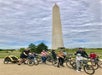 A group of families taking photos at the Washington Monuments