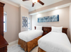 Cozy twin beds for a restful night's sleep.
