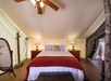 1 Large bed inside a glamping tent.