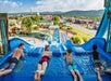 A family lined up at the top of a water slide ready to go down at White Water in Branson, Missouri.