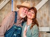 An older man and woman in country style clothes at WhoDunnit Hoedown Murder Mystery Dinner Show in Branson, Missouri.