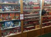 238 toy  firetrucks line the wall