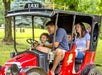 A family having fun while riding Le TaxiTour at Worlds of Fun amusement park in Kansas City, Missouri.