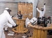 Guest inside the wreck room giving full force in wrecking the items