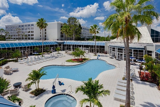 Aerial view of the outdoor pool and hot tub at the Holiday Inn Resort Kissimmee by the Parks.