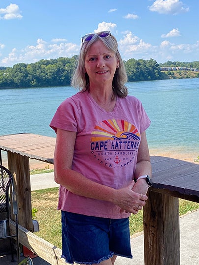 Joan Brock, Director of Partner Marketing at Tripster, enjoying a sunny day by the lake.