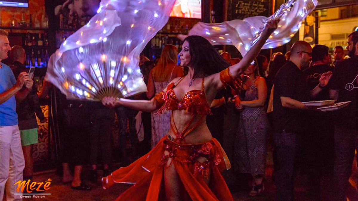 woman performing a belly dancing routine at Meze Greek Fusion in the Gaslamp District in San Diego, California,USA