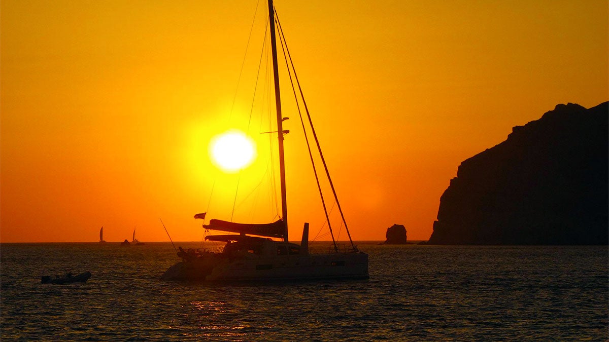 Catamaran in the ocean at Sunset