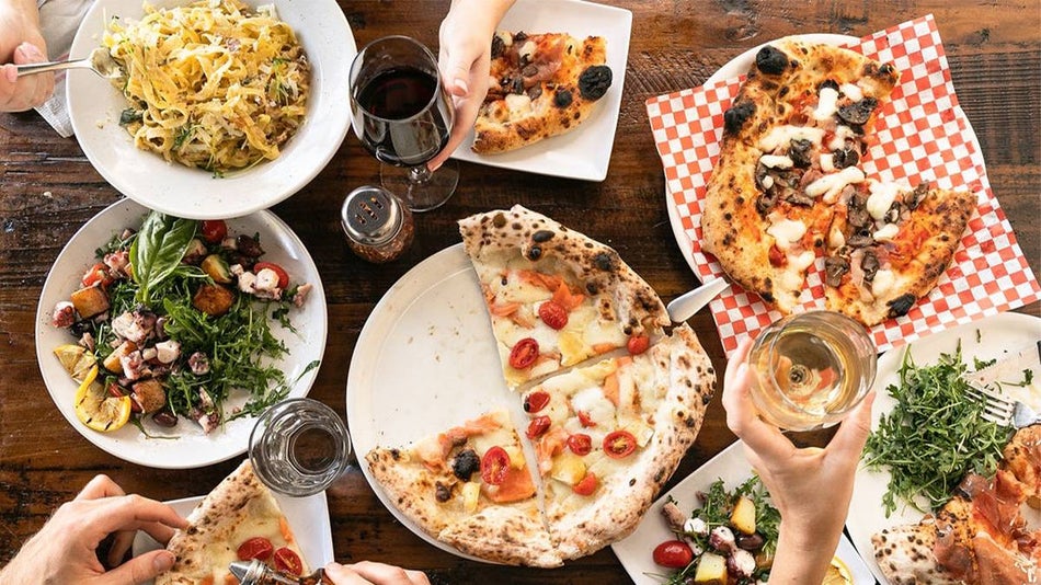 Pizza, salad, and wine at Buona Forchetta - San Diego, California, USA
