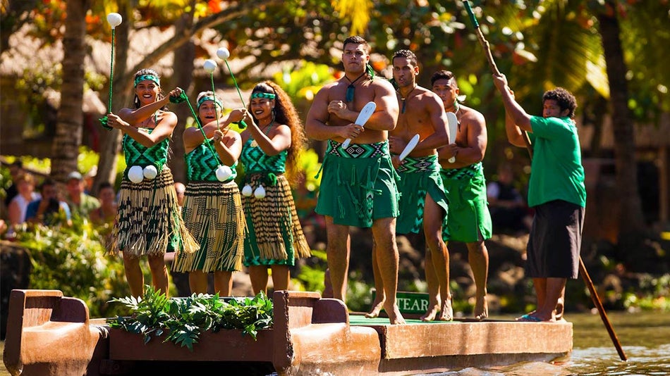 performers on a boat in costumer at Polynesian Cultural Center in Oahu, Hawaii, USA