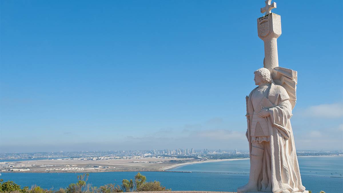Close up view of the Cabrillo National Monument with the skyline in the background in San Diego, California, USA