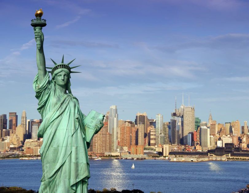Close up of the Statue of Liberty with New York in background - NYC, New York, USA